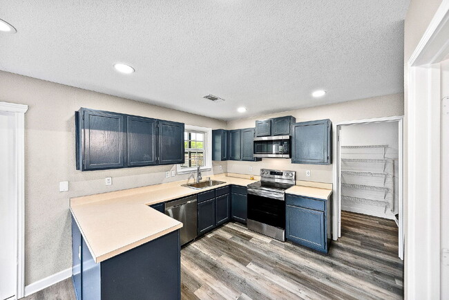 Building Photo - A Waterfall Shower, a Sunroom, and a Story Worth Coming Home To