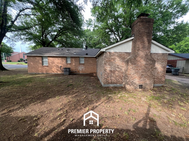 Building Photo - Spacious 3BR/2BA Home with Den & Living Room | Brick Fireplace & Large Yard