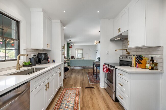 Building Photo - Charming 1935 Tudor in 15th & 15th – Renovated with Modern Luxury