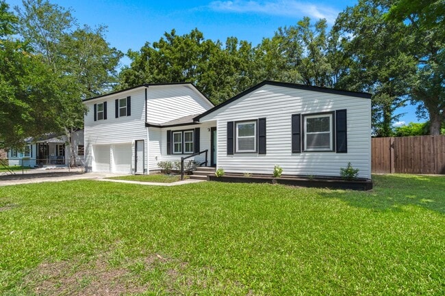 Building Photo - Spacious Split-Level Living with Dual Fireplaces & Expansive Deck