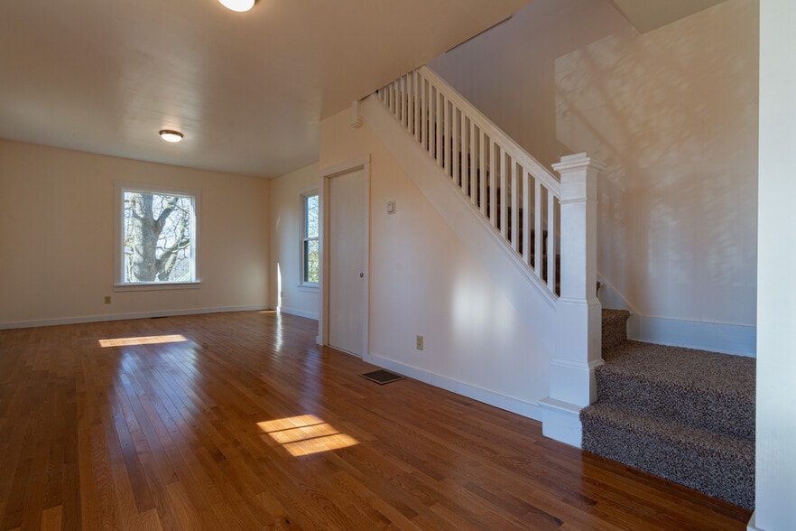 Living area and stairs - 10 Cottage St