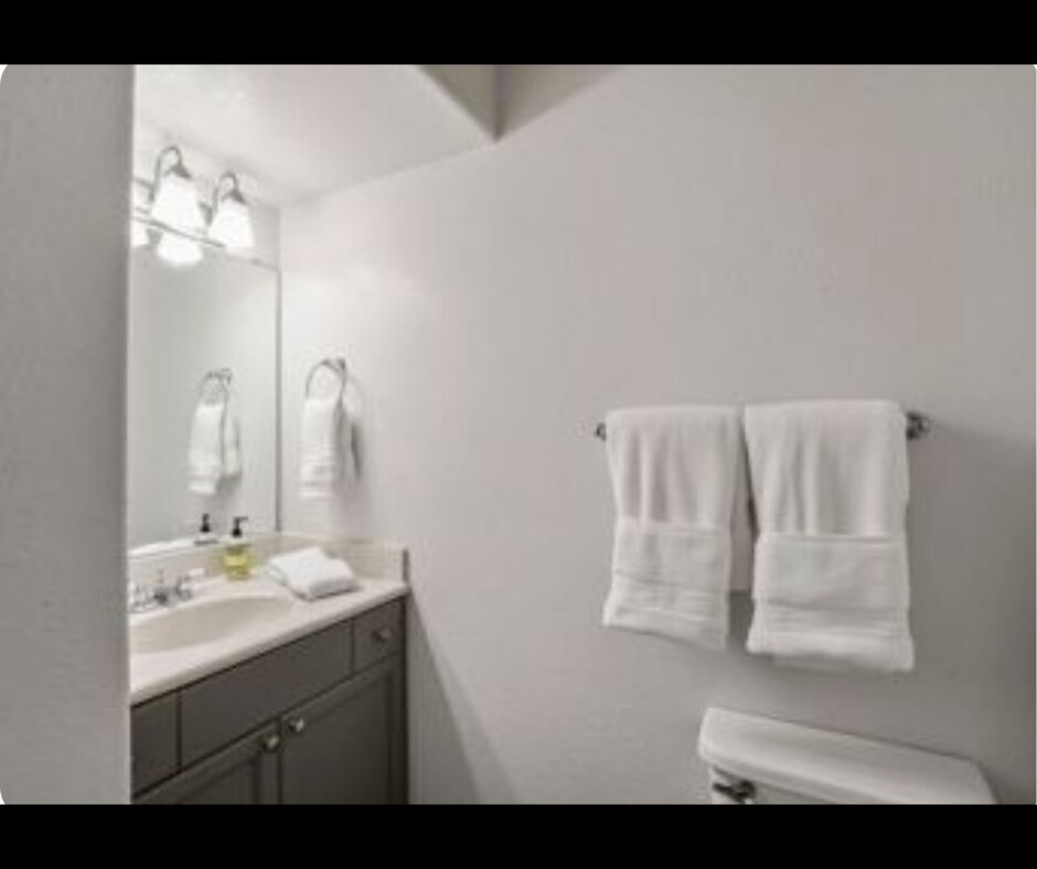 Additional half bathroom on the main level for convenience. - 940 Calla Ave