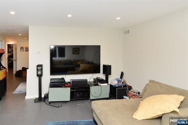 Building Photo - 38-55 van Riper Place Unit 1X