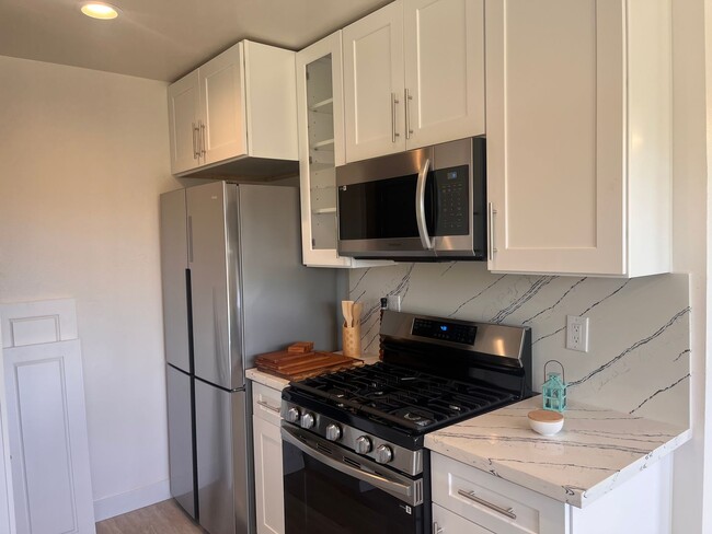 Building Photo - You must see this most amazing Clairemont “penthouse” ever!