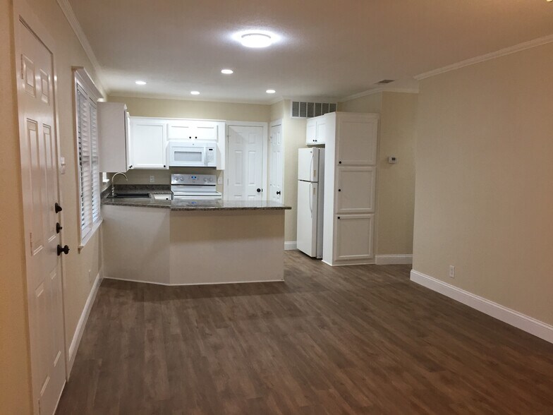 Kitchen and hallway to right - 310 East 3rd St.