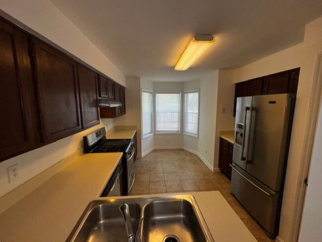 Building Photo - Charming 2-Bedroom Condo in a Peaceful, Tree-Lined Community – Minutes from Uptown Charlotte
