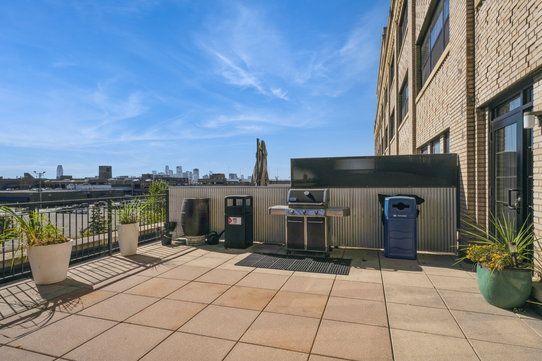 Community Terrace with downtown views and grill - 730 Stinson Blvd