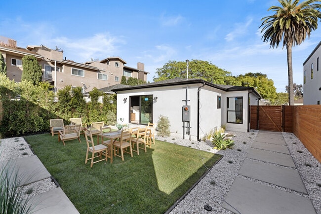Building Photo - Brand-New Designer Home — 2 Bed + 2 Bath + Office | Gated Yard & Private Driveway Parking