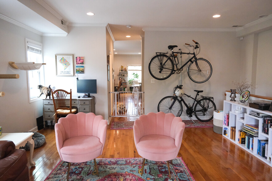 Living room and office space looking into dining room area - 655 16th St NE