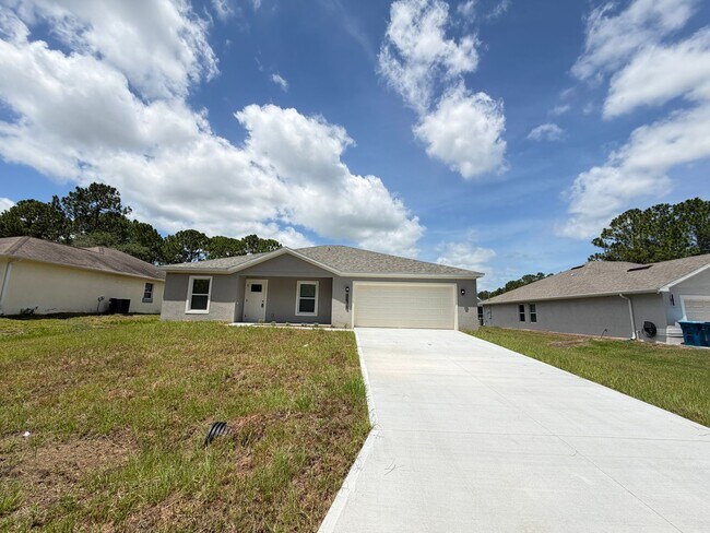 Building Photo - Brand-New 4BR Palm Bay Retreat Designed for Modern Living! NEW BUILD HOME!