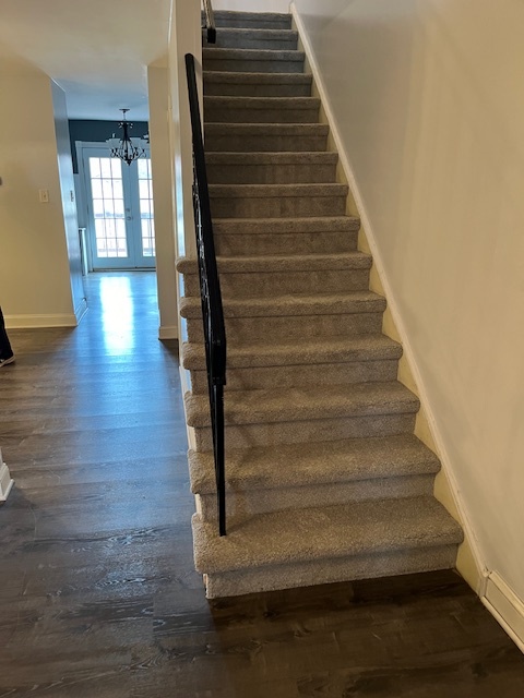 Hallway with steps going to second floor - 303 Walnut Ridge Est