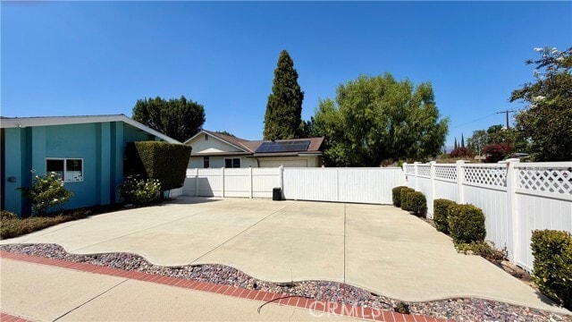 Building Photo - 7843 Woodlake Ave