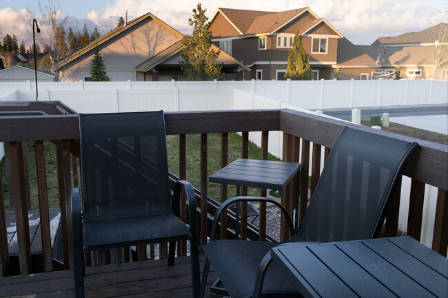 Photo of old deck but shows the deck furniture. 4 chairs and 2 small side tables - 2805 W Dumont Dr