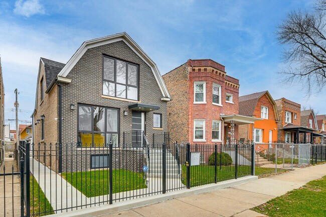 Building Photo - 1034 N Drake Ave
