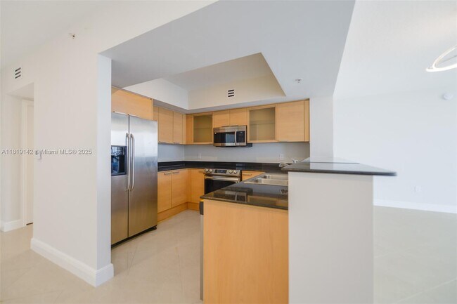 Building Photo - 16699 Collins Ave
