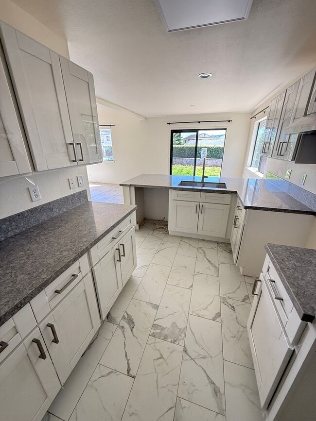 Building Photo - Fully Renovated 4 Bed / 2 Bath Home with 2-Car Garage – $4,500/month