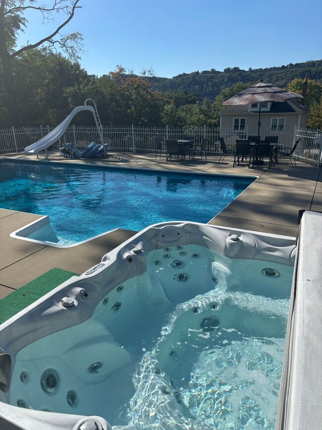 Building Photo - Relaxing summer retreat with pool and hot tub