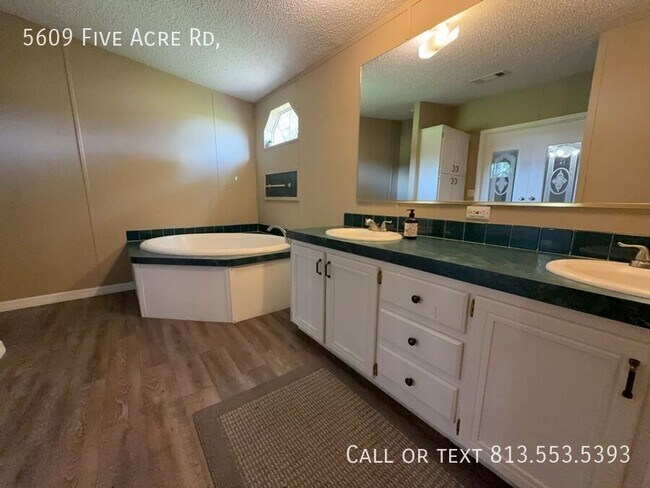 Building Photo - 5609 Five Acre Rd