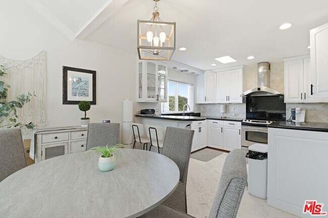 Building Photo - 6400 Pacific Ave