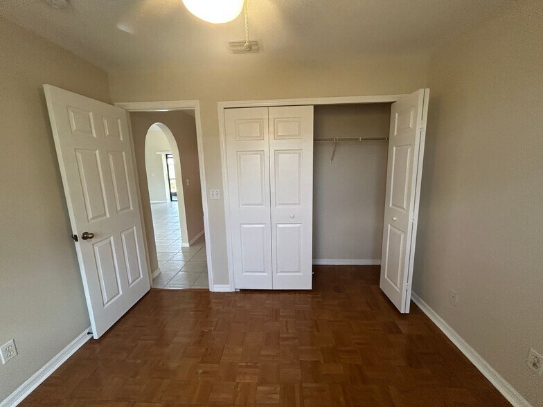 Building Photo - Freshly painted interior 2/2  spacious home on fresh water canal