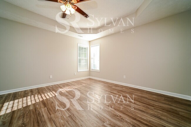Building Photo - Welcome to this charming abode.