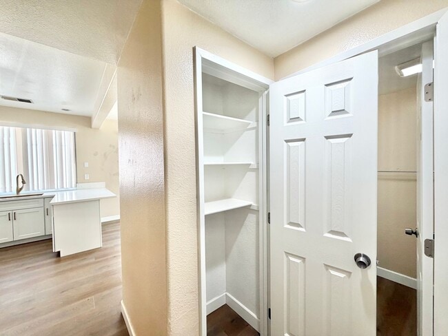 Building Photo - Spacious 5 Bedroom Home with 3 Car Garage & Primary Suite Balcony