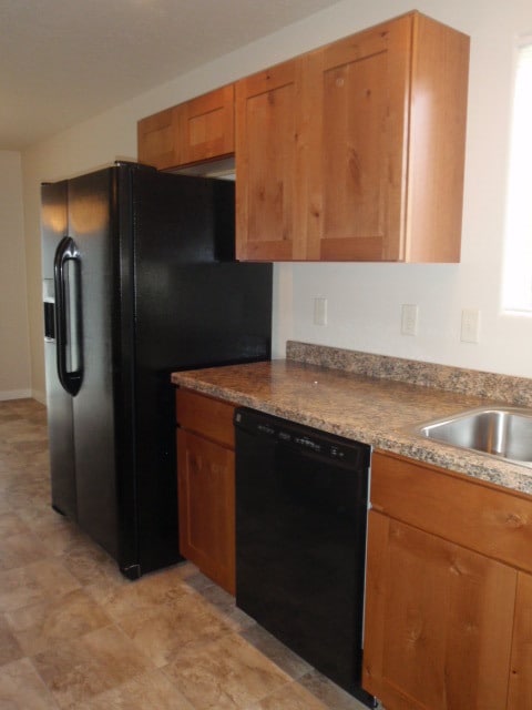 Building Photo - Newer house with attached garage. Half mon...