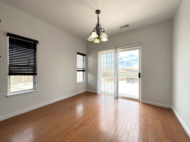 Building Photo - 4 bedrooms, 2 1/2 Baths with a 3 Car Garag...