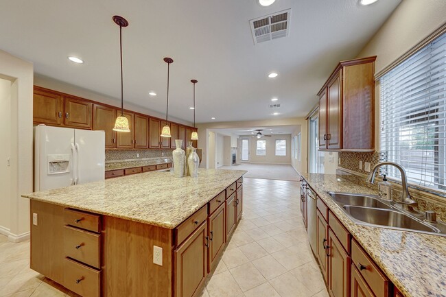 Building Photo - 5 Bedroom Corner Lot Home in Gated Community!