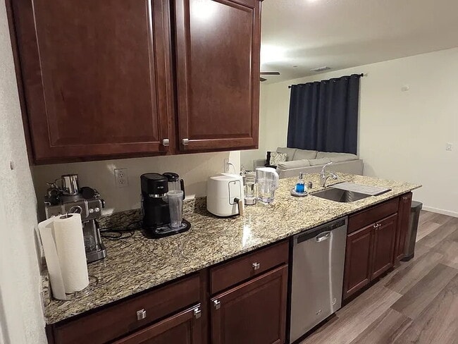 Building Photo - This stunning three-bedroom, two-bathroom home offers an incredible amount of space and upgrades,...
