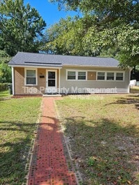 Building Photo - 5821 Robinhood Dr