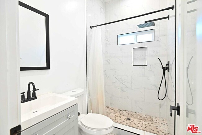 Building Photo - 6961 Balcom Ave