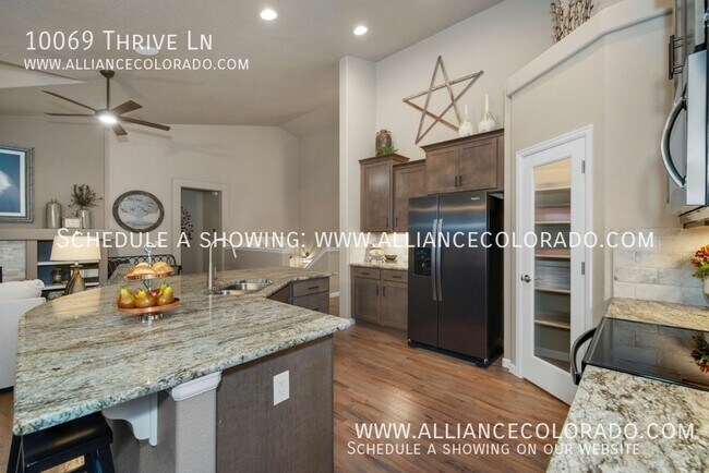 Building Photo - 10069 Thrive Ln