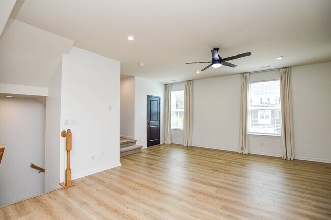 Building Photo - 3 Bedrooms | 2.5 Bathrooms | Lower-Level Flex Room | Approximately 1,978 Square Feet | 2-Car Gara...