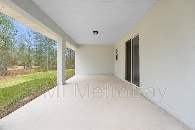 Building Photo - 9461 N Sandree Dr