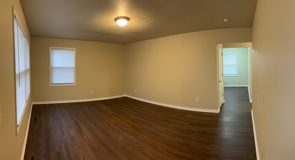 Building Photo - 8599 E H Ave