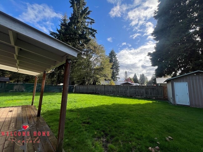 Building Photo - Beautiful Remodeled Rambler!!!  Come enjoy this HUGE backyard!!  NEW CARPET!!