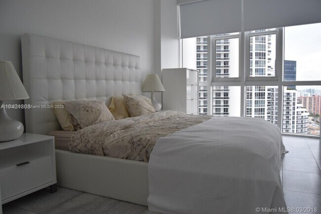 Building Photo - 18201 Collins Ave