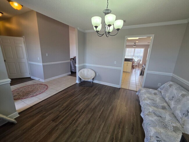 Building Photo - Available May! Non-Furnished Unit!