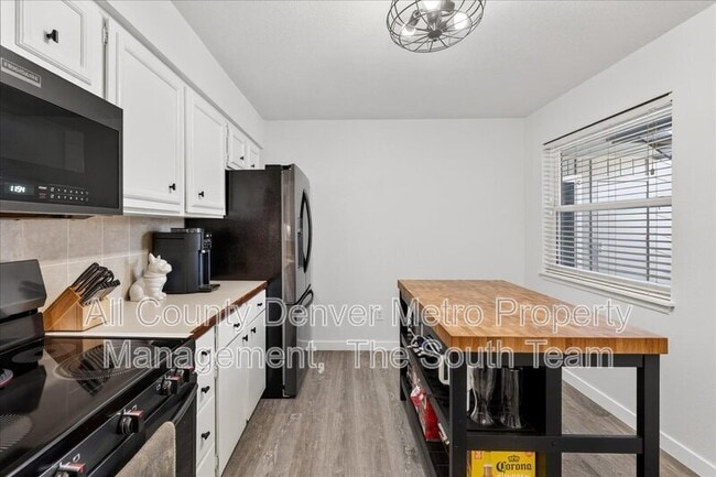 Building Photo - 7250 S Gaylord St