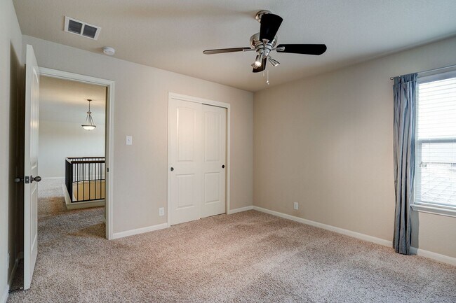 Building Photo - Bright & Roomy 4BR • 2.5BA • Two-Level Living