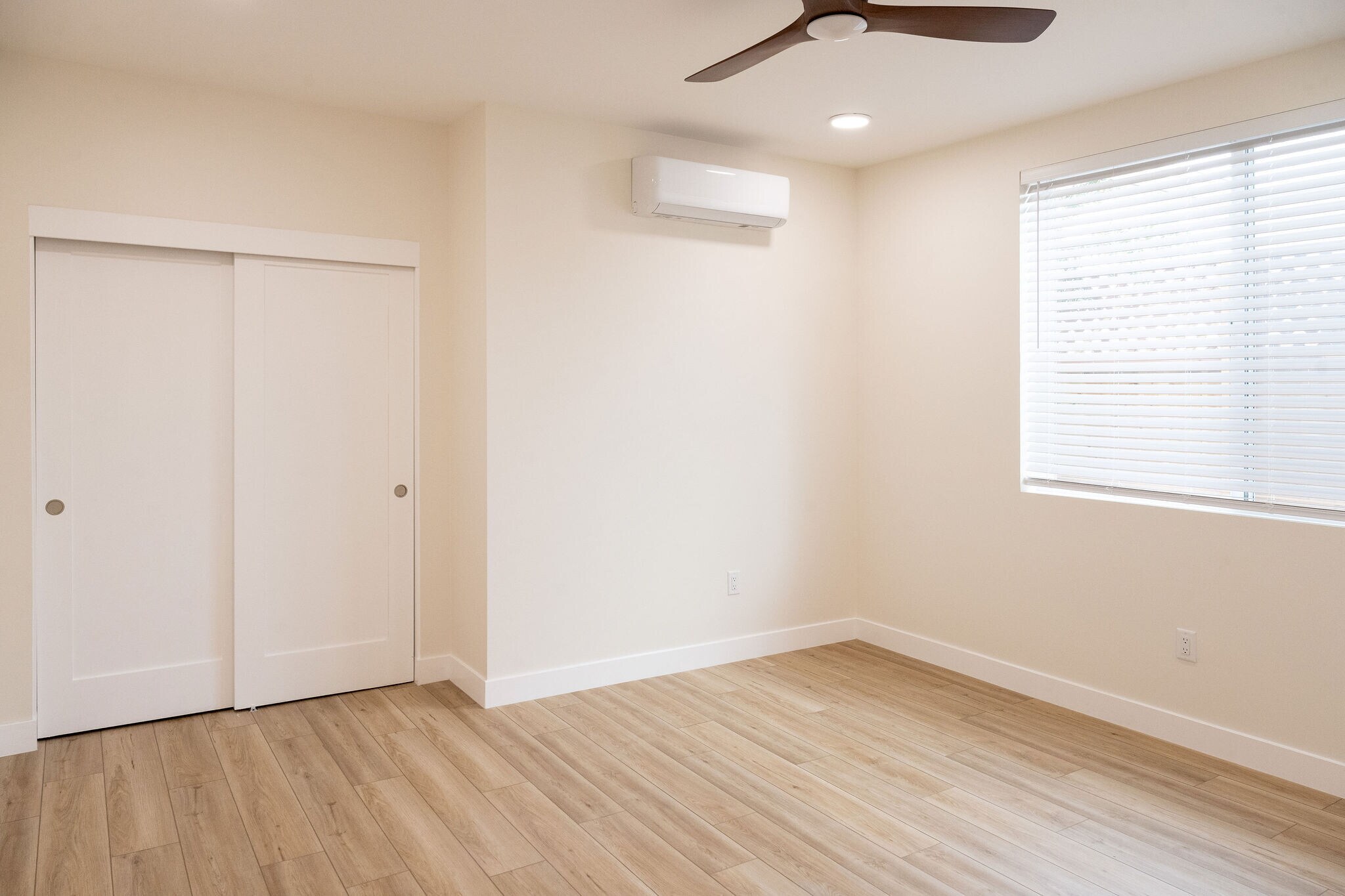 Bedroom with mini split, large closet and large windows - 4772 Bancroft St
