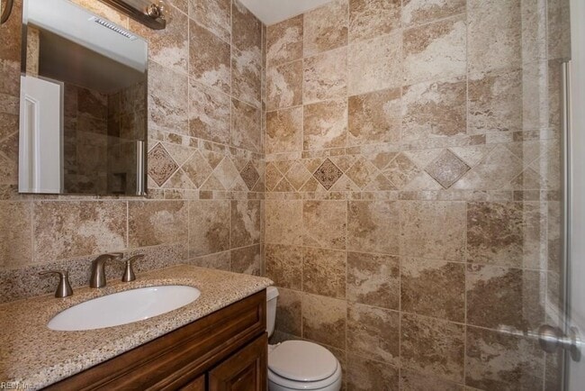 Building Photo - LOVELY 2 BR, 2 FULL BATH CONDO 1 BLOCK FROM THE CHESAPEAKE BAY!!