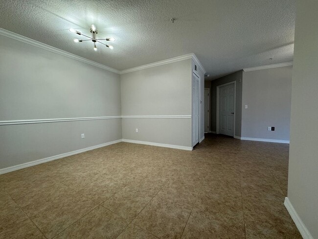 Building Photo - Oviedo 2/2 Condo with Tile & LVP Flooring, Updated Baths, New Paint & Appliances!