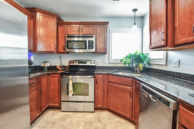 Building Photo - Dog Friendly Four Bedroom!