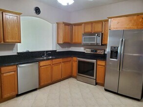 Building Photo - Coming mid August  4 Bedroom Forum Townhome