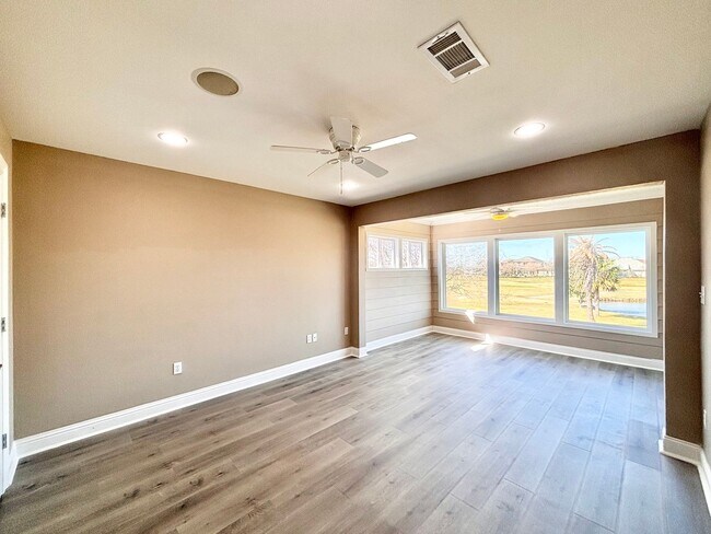 Building Photo - Stunning 5-Bedroom Home with Breathtaking Lake & Golf Course Views – Pelican Point Subdivision