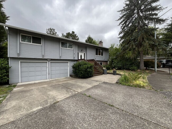 Building Photo - Three-Bedroom Home Near Nike Campus with Bonus Room, Large Deck & Two-Car Garage