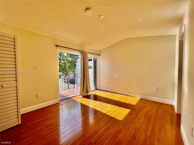 Building Photo - 3 br, 2.5 bath Condo - 8625 SW 152nd Ave A...