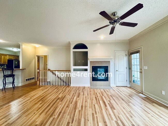 Building Photo - Maintenance Free! Main level Master, Finished Basement and Wood Floors in the Kitchen! *Brand New...